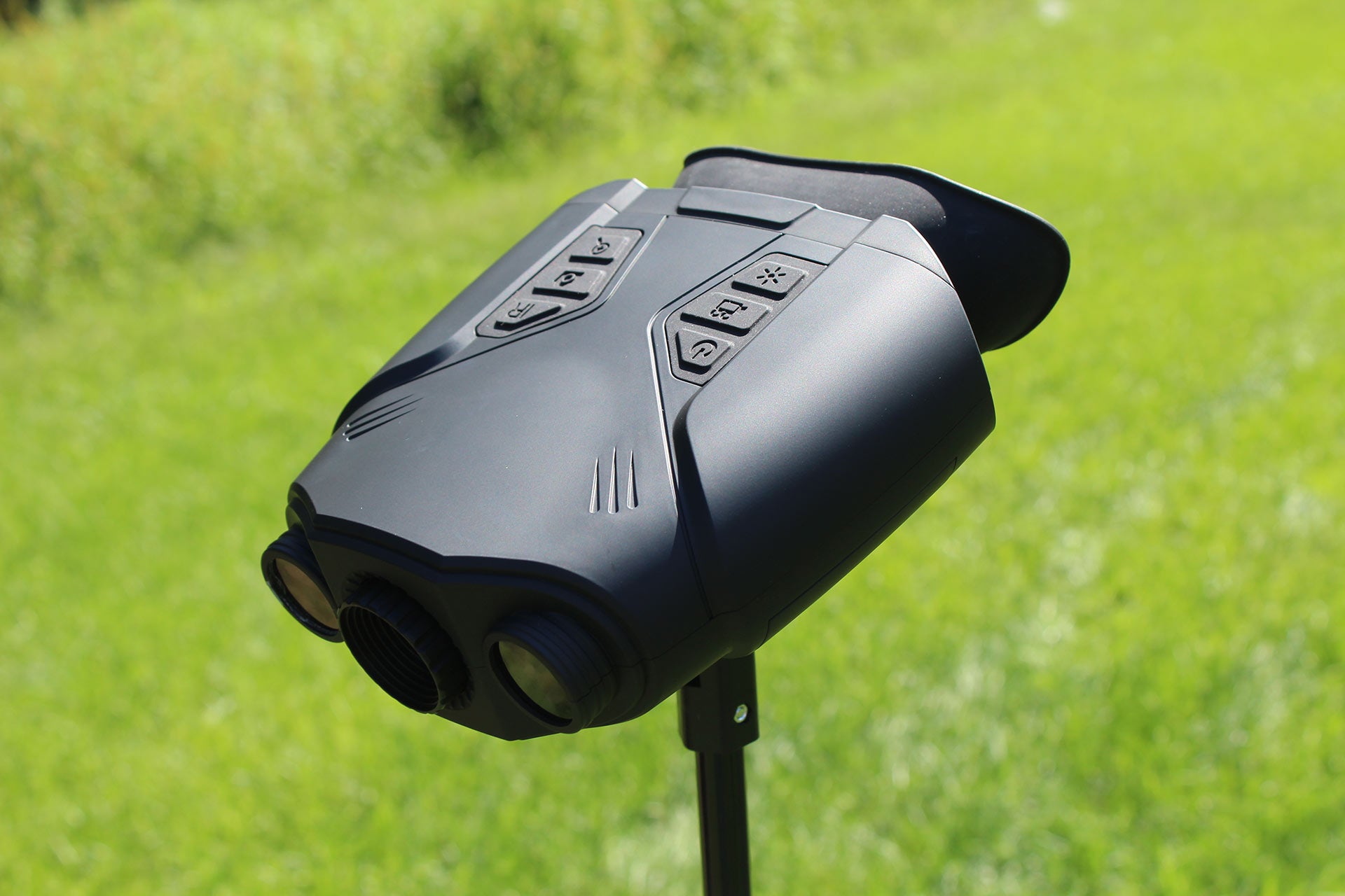 Night vision binoculars on a tripod